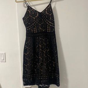 Aqua black lace dress with nude under lay. Size XS